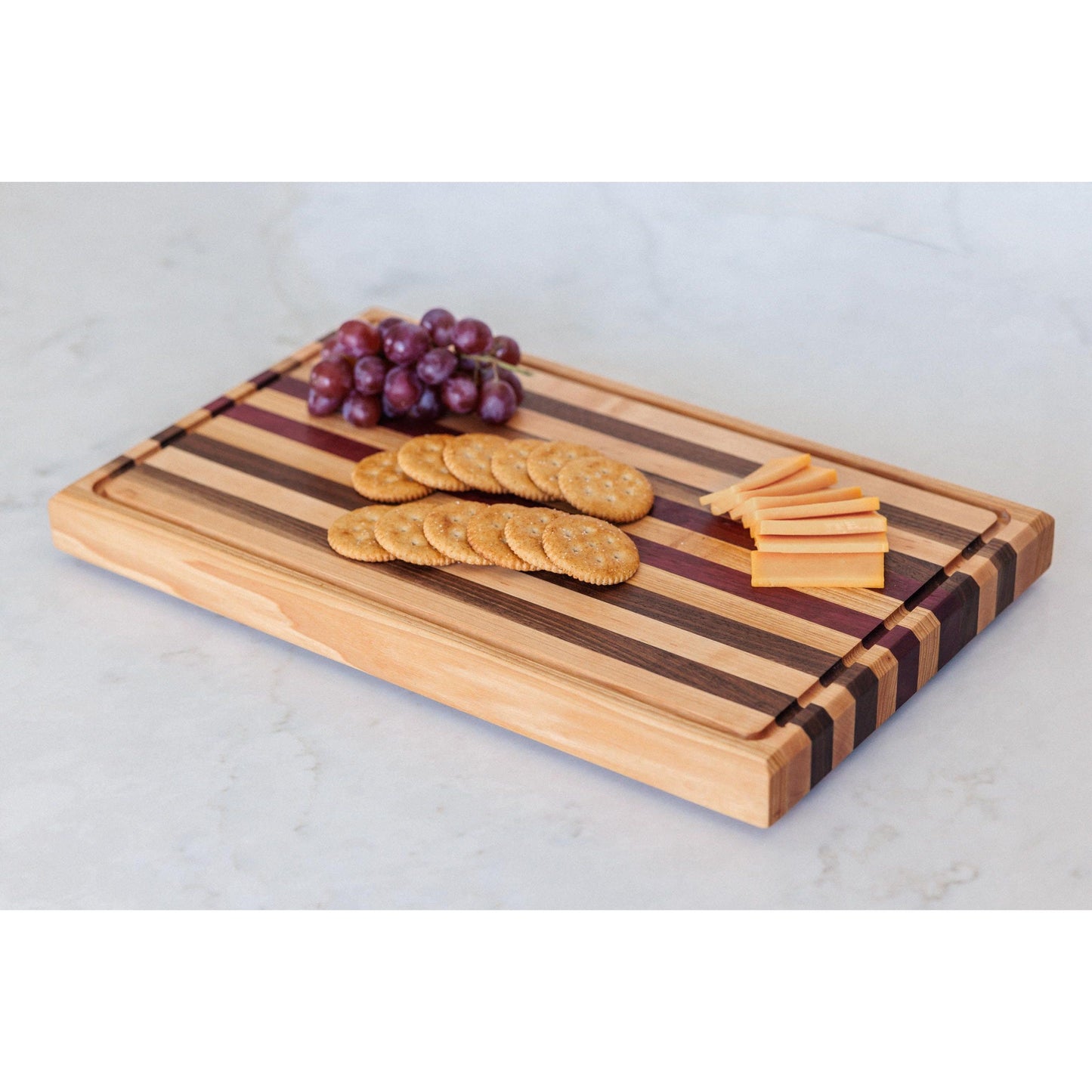 Large Hardwood cutting board with juice groove! Walnut, purple heart, hickory, hard maple, and cherry. 17"x10.5"x1.5"