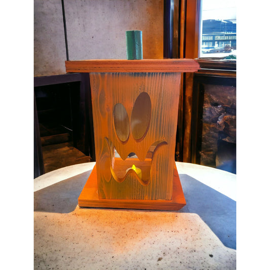Our FarmStyle Jack-O-Lanterns, complete with LED tea lights, measuring approximately 8"x8"x12". Illuminate your space with the warm and inviting glow of these charming rustic lanterns, perfect for adding a touch of farmhouse-inspired charm to your decor.
