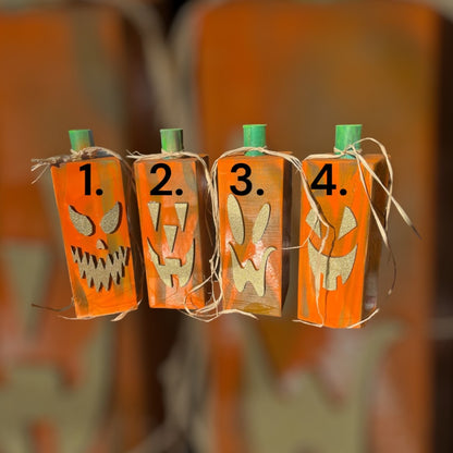 Glitz and Glammy Jack-O-Lanterns" is a fun and creative way to add a touch of glamour to your Halloween decorations. Here are four styles to choose from to make your jack-o-lanterns stand out! (9" Tall x 3.5" square")