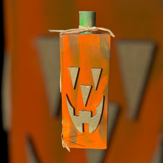 Glitz and Glammy Jack-O-Lanterns" is a fun and creative way to add a touch of glamour to your Halloween decorations. Here are four styles to choose from to make your jack-o-lanterns stand out! (9" Tall x 3.5" square")