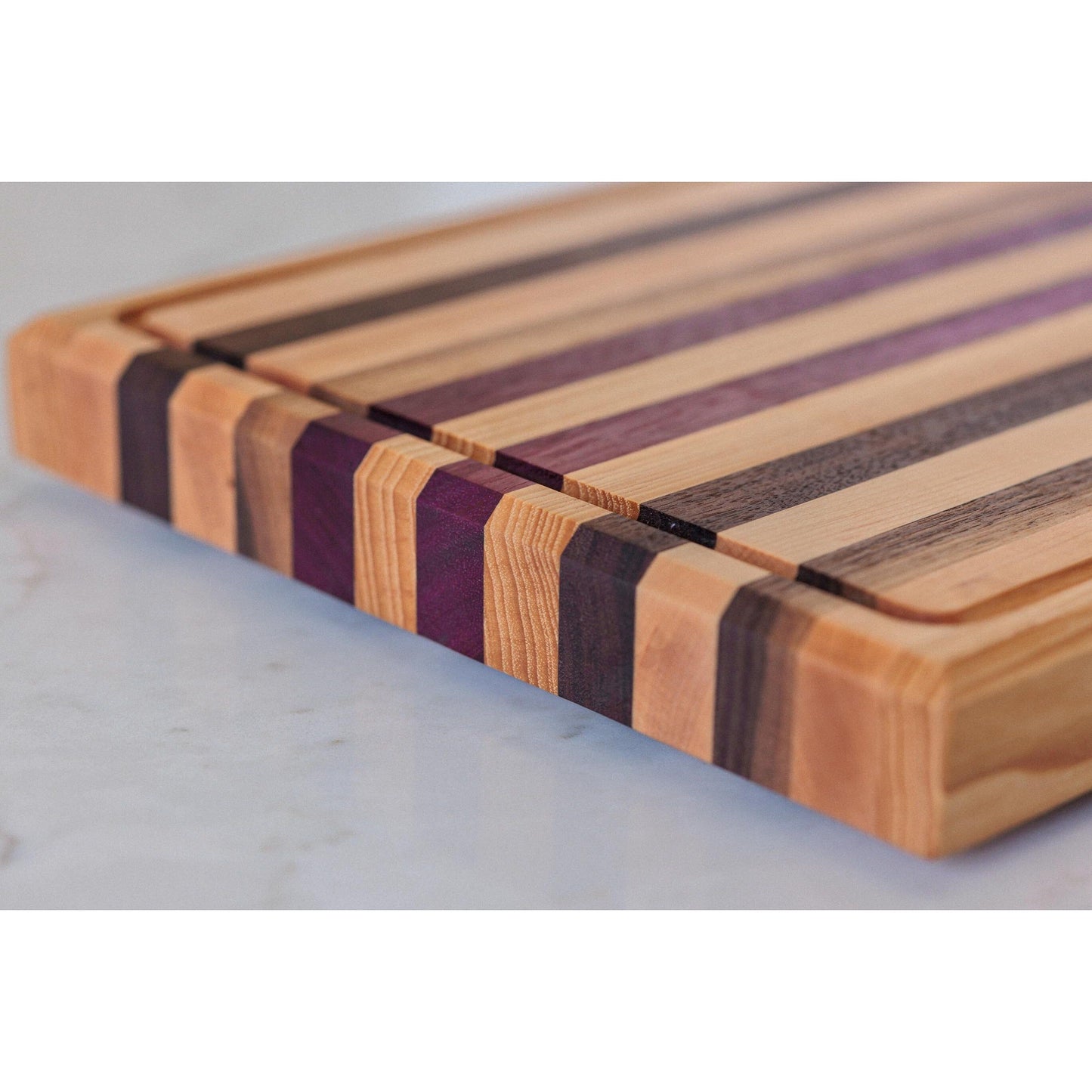 Large Hardwood cutting board with juice groove! Walnut, purple heart, hickory, hard maple, and cherry. 17"x10.5"x1.5"