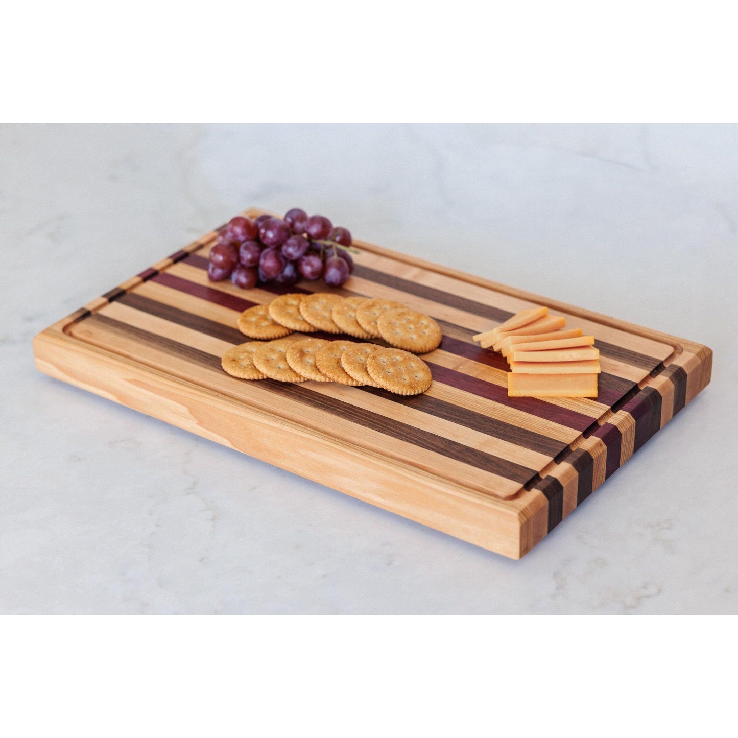 Large Hardwood cutting board with juice groove! Walnut, purple heart, hickory, hard maple, and cherry. 17"x10.5"x1.5"
