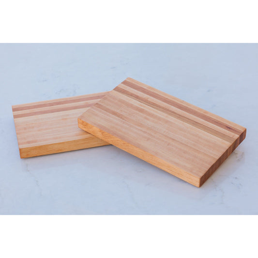 Experience the allure of our large hardwood cutting board. Expertly crafted from hard maple and hickory, this exquisite gift measures approximately 17"x10.5"x1.5". Combining beauty and functionality, it's the perfect present for culinary adventurers.