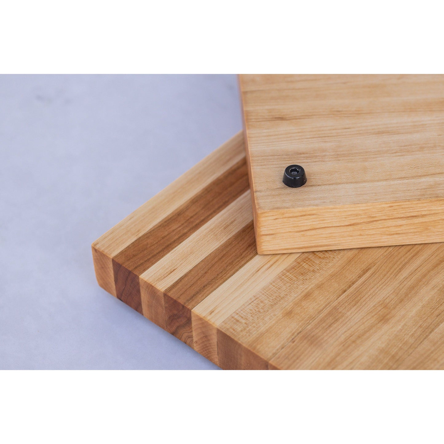 Experience the allure of our large hardwood cutting board. Expertly crafted from hard maple and hickory, this exquisite gift measures approximately 17"x10.5"x1.5". Combining beauty and functionality, it's the perfect present for culinary adventurers.