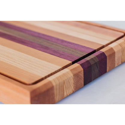 Large Hardwood cutting board with juice groove! Walnut, purple heart, hickory, hard maple, and cherry. Approx 17"x10.5"x1.5"