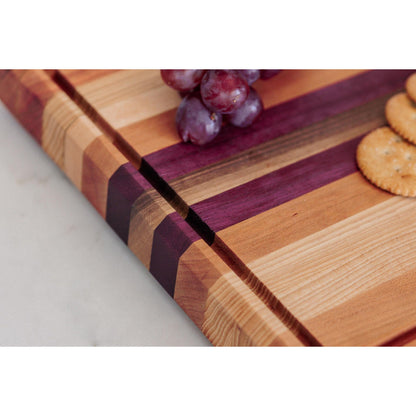 Large Hardwood cutting board with juice groove! Walnut, purple heart, hickory, hard maple, and cherry. Approx 17"x10.5"x1.5"